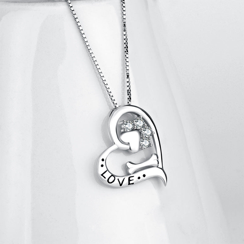 Heart-Shaped Cutout Necklace with Dog Paw Bone Pendant