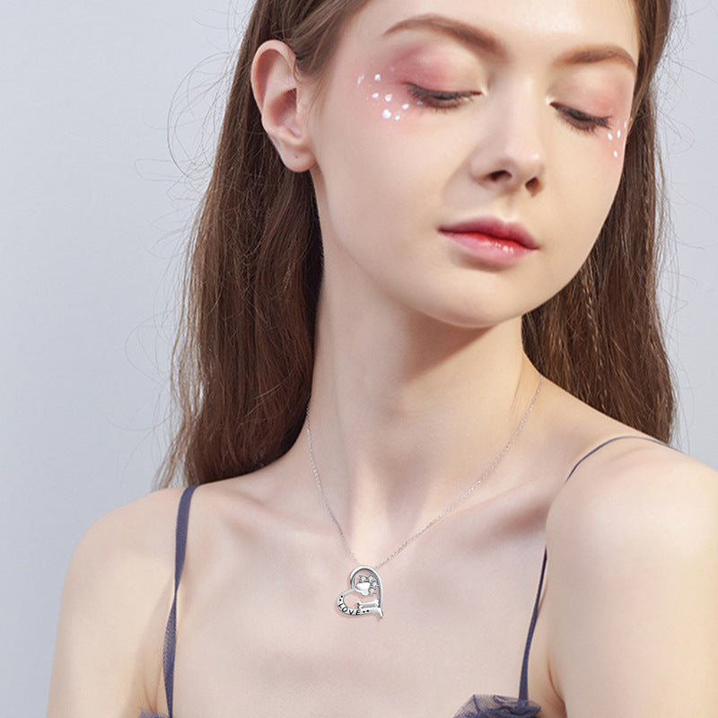 Heart-Shaped Cutout Necklace with Dog Paw Bone Pendant