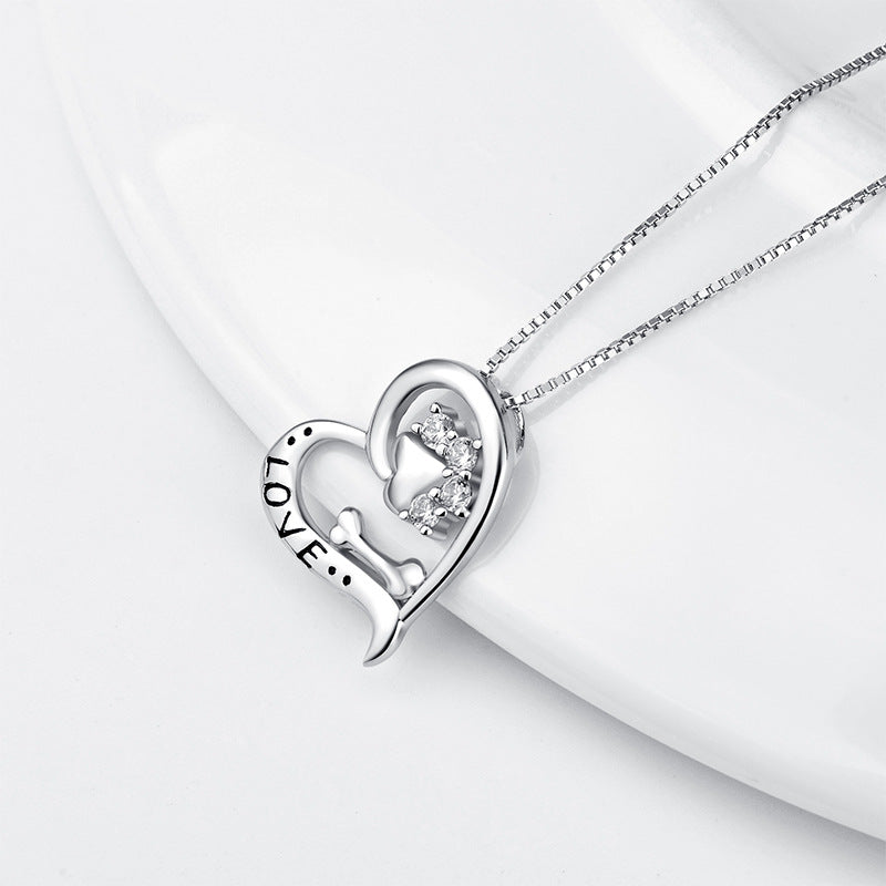Heart-Shaped Cutout Necklace with Dog Paw Bone Pendant